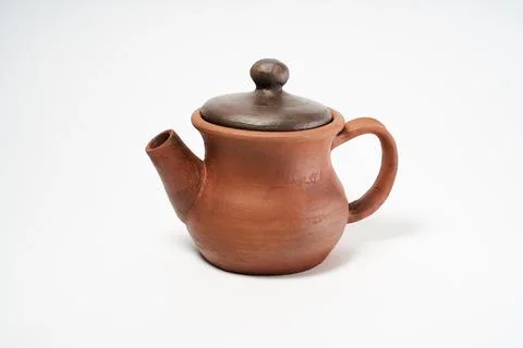 Ceramic product with your own hands, made on a Potter's wheel, isolated on a  Stock Photos