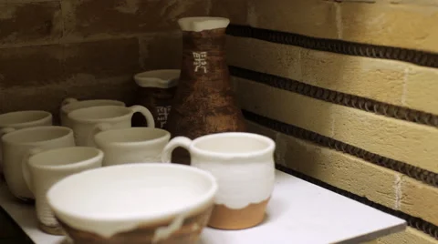 Ceramic Products Put Into the Oven Stock Footage 60996664