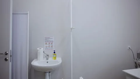 Ceramic sink and office desk in sterile medical room Vídeo Stock 332268705