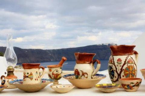 Ceramic souvenirs in Oia, vases and decorative cups in shop in Santorini Stock Photos