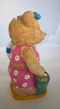 Ceramic statue antique teddy bear doubling up as piggy bank Stock Photos