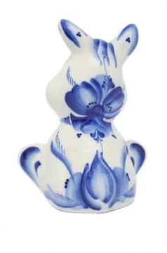 Ceramic statue hare sitting backwards isolated on white background Stock Photos