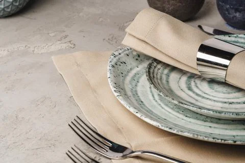 Ceramic stylish tableware set on grey background Foto stock