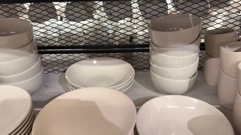 Ceramic tableware collection displayed on store shelves Stock Footage 318013944