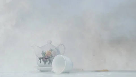 Ceramic tea set and powder after explosion, Ultra Slow Motion Stock Footage 86578332