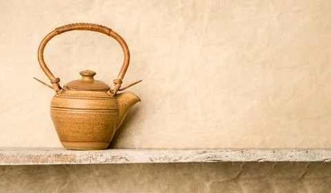 Ceramic teapot on a shelf, copy space for promo or ad, banner Stock Photos