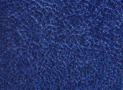 Ceramic tile blue leather effect background. Closeup texture Stock Photos