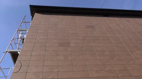 Ceramic tile house wall after restoration and insulation Stock Footage 38457005