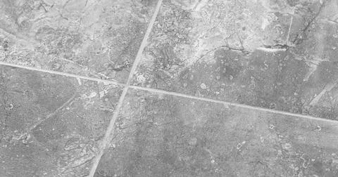 Ceramic tile seam close-up view, interior surface background Stock Photos