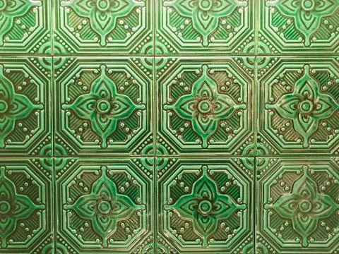 Ceramic tile texture full frame. green geometric flower pattern on mosaic tiles Stock Photos