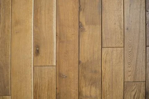 Ceramic tile with a wood texture on a kitchen or living room. Stock Photos
