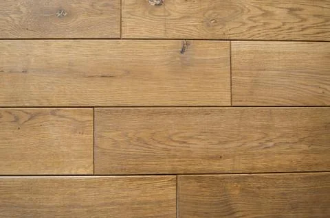 Ceramic tile with a wood texture on a kitchen or living room. Stock Photos