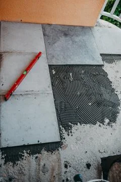 Ceramic tiles and tools for tiler ceramic tiles installation Home improvement Stock Photos