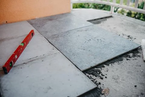Ceramic tiles and tools for tiler ceramic tiles installation Home improvement Stock Photos