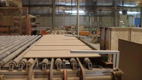 Ceramic tiles being transported with conveyor belt in factory Stock Footage 217518310