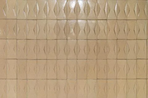 Ceramic tiles embossed geometric pattern on interior wall Stock Photos