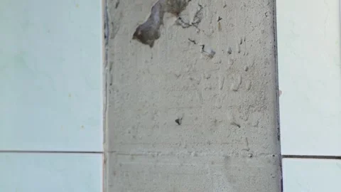 Ceramic tiles fell off facade of wall Stock Footage 265665428