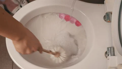Ceramic Toilet During a Flush, Close-up from Above Stock Footage 170948844