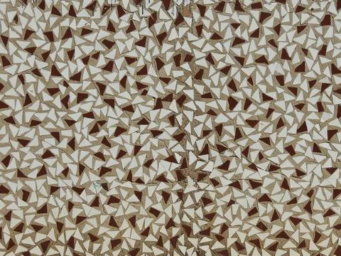 Ceramic triangle tile mosaic on wall Stock Photos