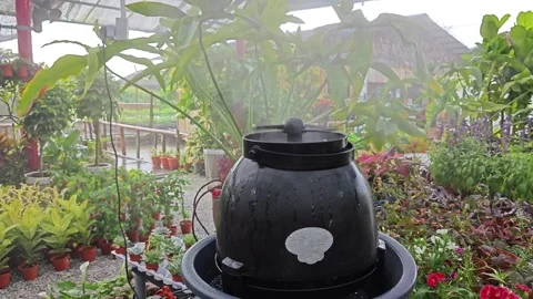 Ceramic vase humidifier Stock Footage 246618999