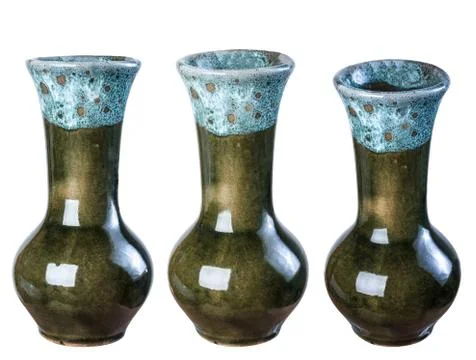 Ceramic vase isolate on a white background, closeup in a variety of ways. Stock Photos