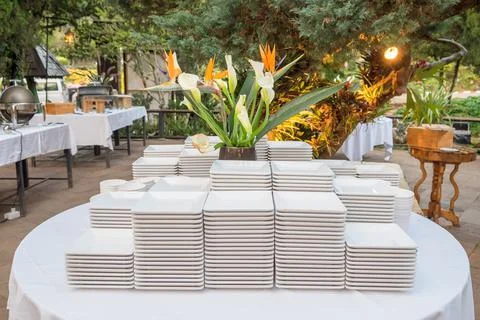 Ceramic white plate stacked on table Stock Photos