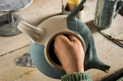 Ceramic workshop finished pot is painted blue Pittenhart Upper Bavaria Germany Stock Photos
