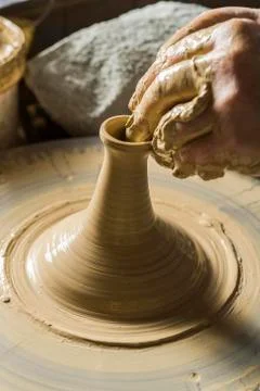 Ceramic workshop hands forming spout on pottery wheel Pittenhart Upper Bavaria Stock Photos