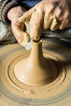 Ceramic workshop hands forming spout on pottery wheel Pittenhart Upper Bavaria Stock Photos