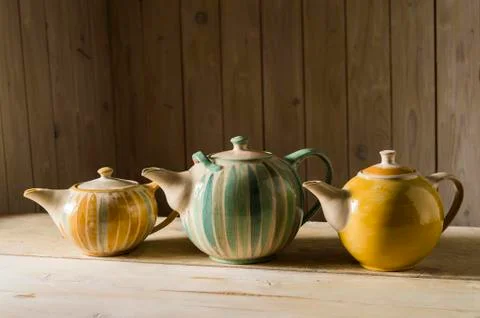 Ceramic workshop three glazed pots on workbench Pittenhart Upper Bavaria Stock Photos