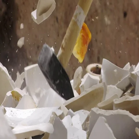 Ceramics getting smashed by hammer Stock Footage 69280783