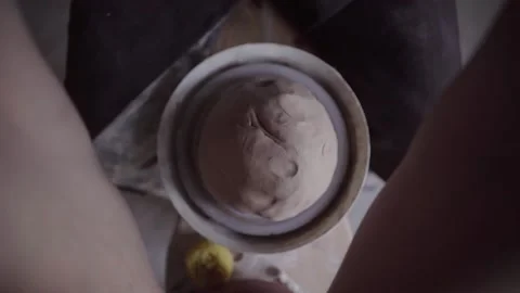 Ceramics studio. Potter at work. Clay bowl spinning on pottery wheel. 스톡 동영상 143376962