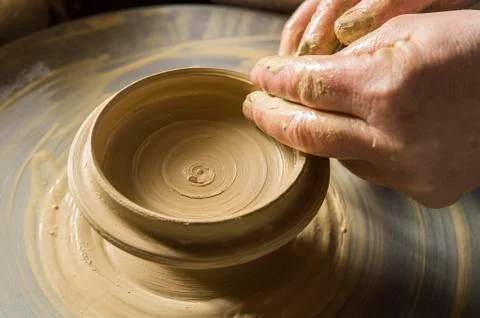 Ceramics workshop hands working lid on pottery wheel Pittenhart Upper Bavaria 스톡 사진