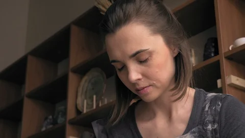 Ceramist creates a pattern and relief dolly shot Stock Footage 104870562