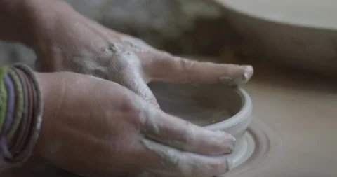 Ceramist making a cup v2/pt 1 Stock Footage 127527014