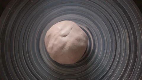 Ceramist Start Working. Put a Piece of White Clay on Pottery Wheel. Young Artist Stock Footage 140287370