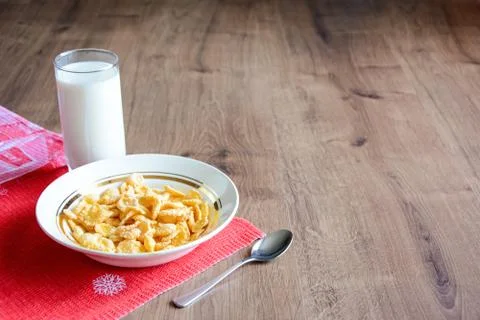 Cereal and fruit for Breakfast on the table. Delicious food at h Stock Photos