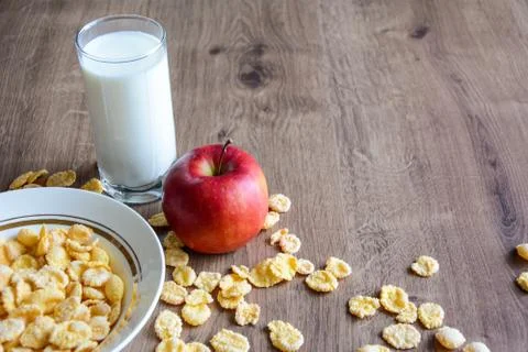 Cereal and fruit for Breakfast on the table. Delicious food at h Stock Photos
