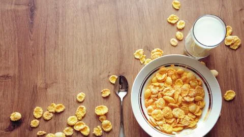 Cereal and fruit for Breakfast on the table. Delicious food at h Stock Photos