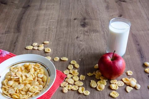 Cereal and fruit for Breakfast on the table. Delicious food at h Stock Photos