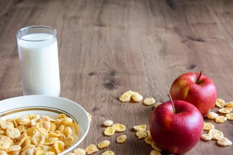 Cereal and fruit for Breakfast on the table. Delicious food at h Stock Photos