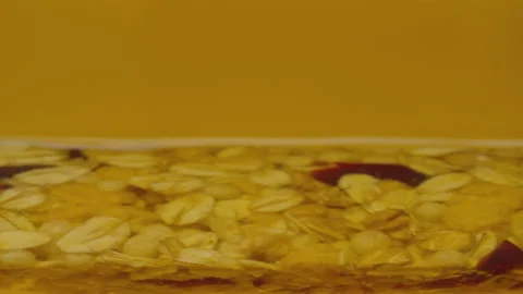 Cereal bar in the honey Stock Footage 176450861
