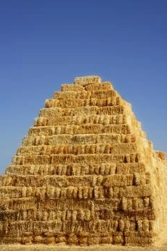 Cereal barn with square shape stack on columns Stock Photos