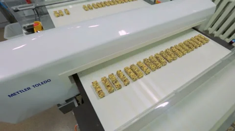 Cereal bars on the conveyor belt Stock Footage 62525274