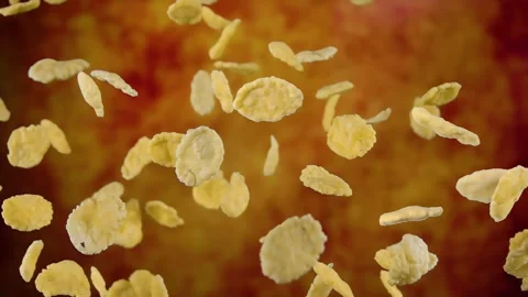 Cereal corn flakes are flying up and rotating Stock Footage 314110861