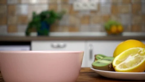 Cereal flake fall down to the bowl, slow motion video Stock Footage 83116999