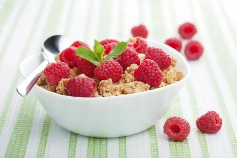 Cereal with fresh raspberry Stock Photos