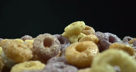 Cereal rainbow hoops. Closeup shot of healthy multicolored cereal. Stock Footage 143376143