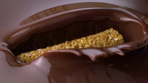  Cereal Snack Splashing Into Chocolate Bath Stock Footage 81795708