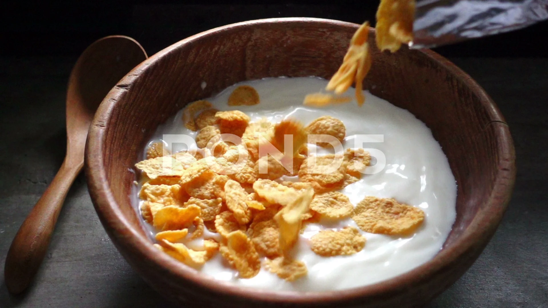 Pouring Milk Into Bowl Of Cereal Stock Photo - Download Image Now